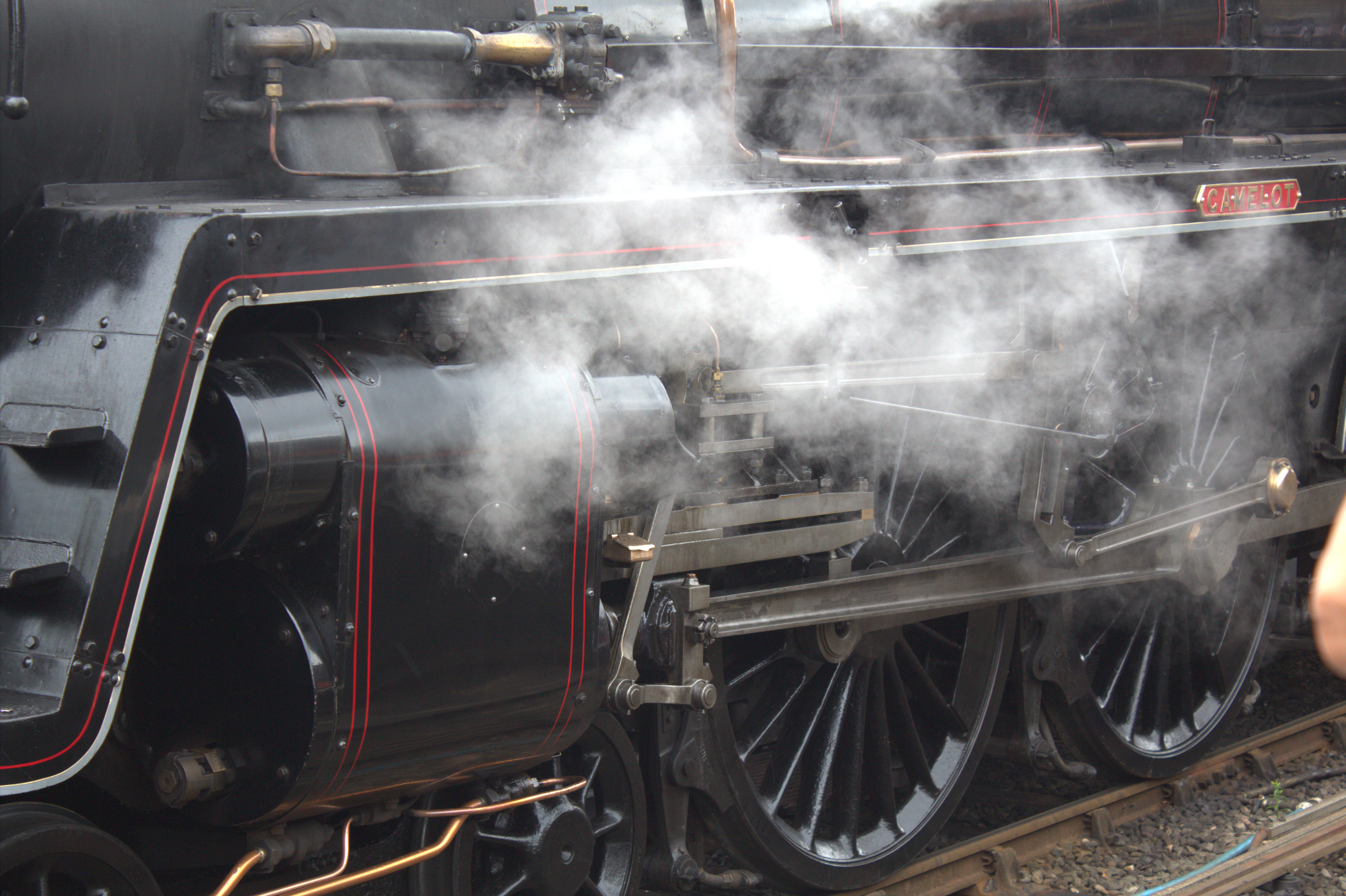 The wheels of a steam locomotive
